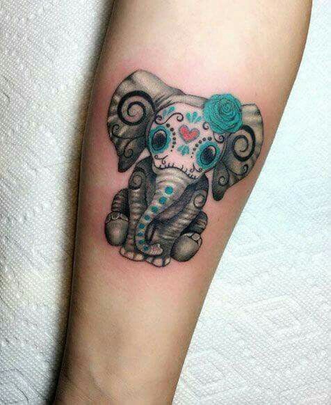 tatuagem de caveira mexicana com animais