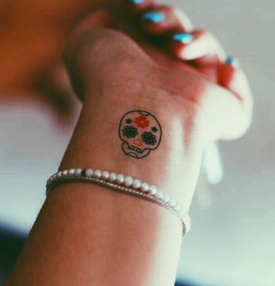 tatuagem de caveira mexicana delicada