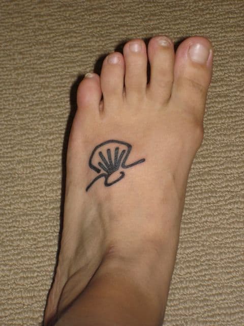 tatuagem de concha para fazer no pé