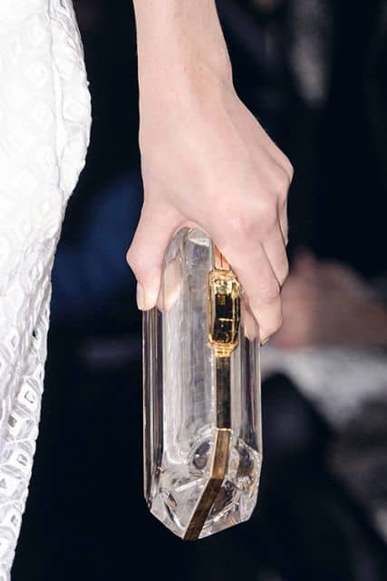 mochila transparente cluthe com dourado