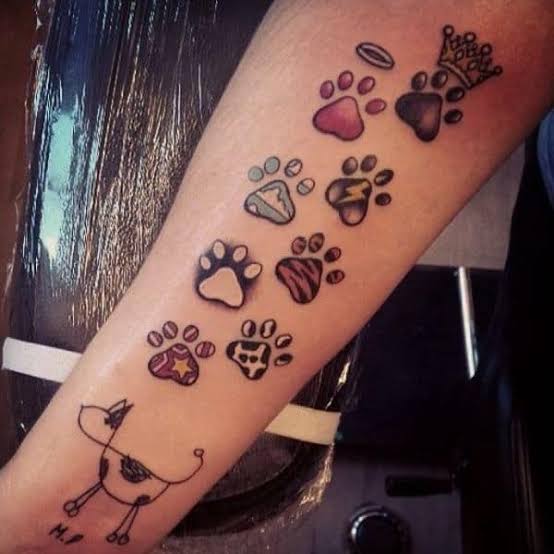 tattoo de pata de cachorro no braço