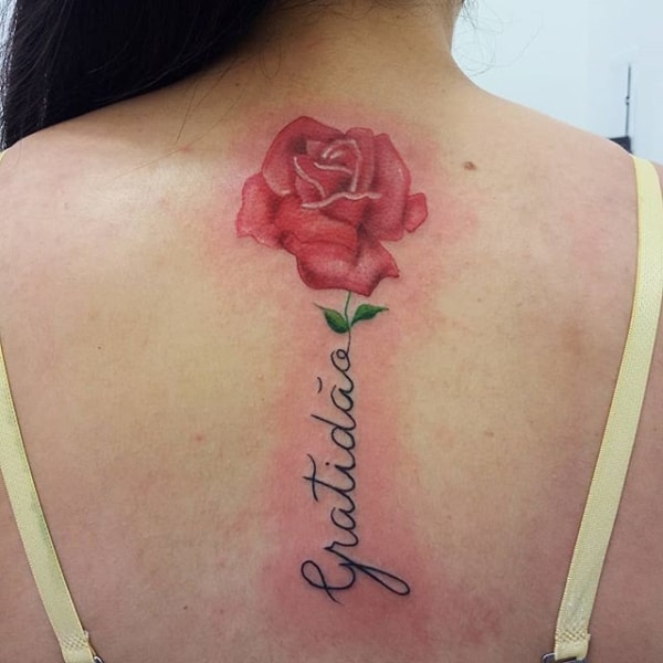 tatuagem gratidão nas costas grande