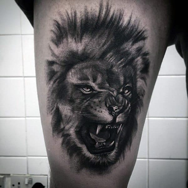 tatuagem na coxa masculina leão
