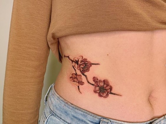 tatuagem de flor de cerejeira