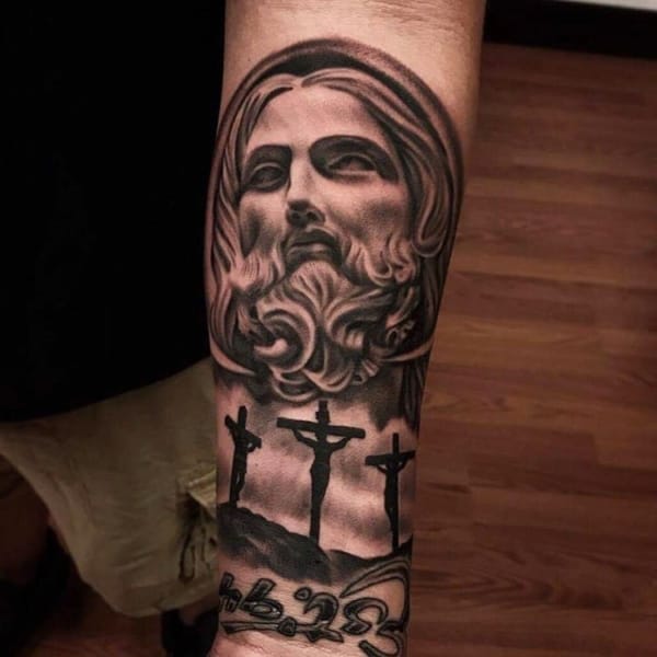 Tatuagem Jesus Cristo no braço