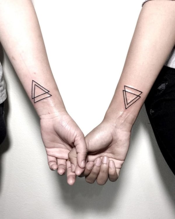 Tatuagem triângulo equilíbrio