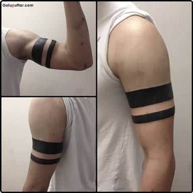 tatuagem no bíceps masculino bracelete preto