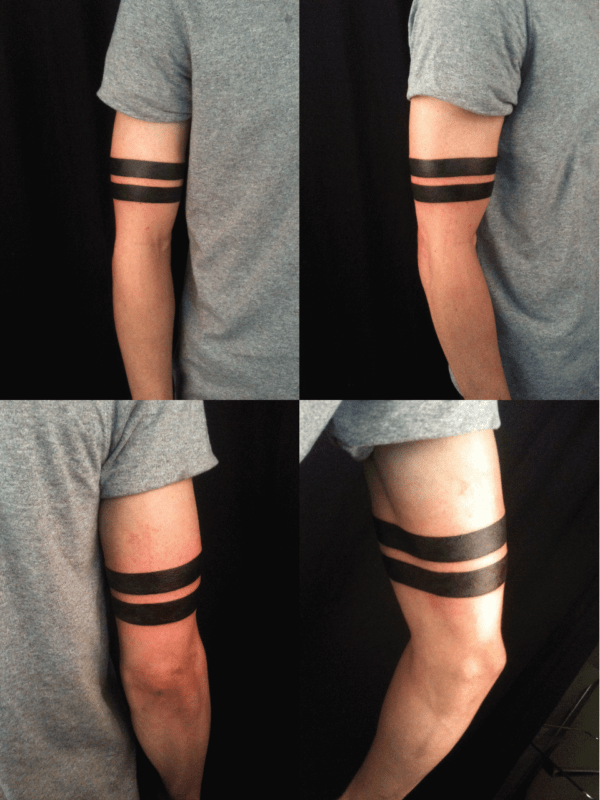tatuagem no bíceps masculino bracelete simples