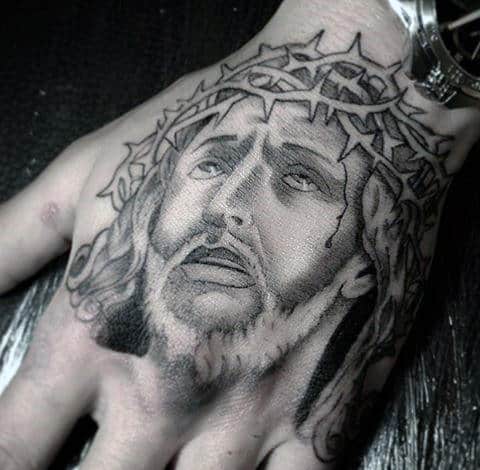 tatuagem simples na mão de Jesus