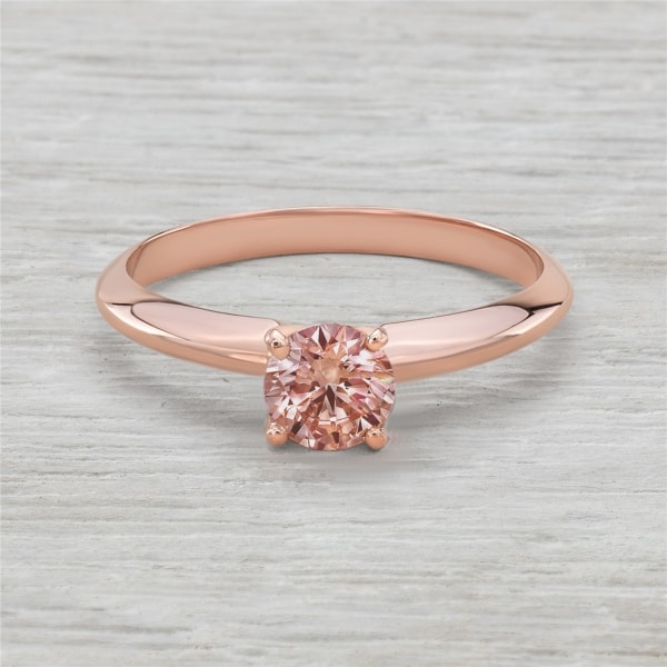 anel em ouro rosé com diamante rosa