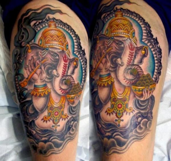 Tatuagem Ganesha na perna coxa