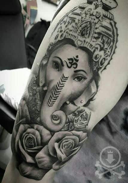 Tatuagem Ganesha no braço