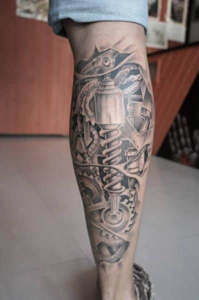 tattoo biomecânica de amortecedor na perna