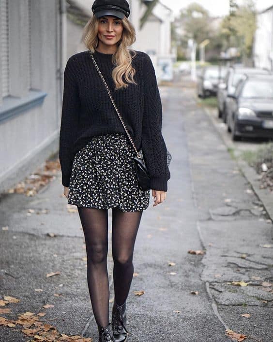 Suéter preto pode ser usado com saia ou vestido