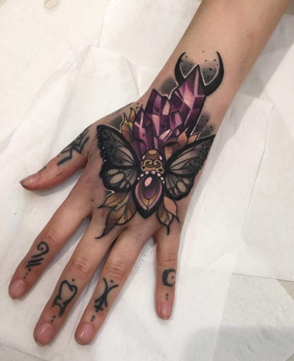 Tatuagem de Mariposa na mão