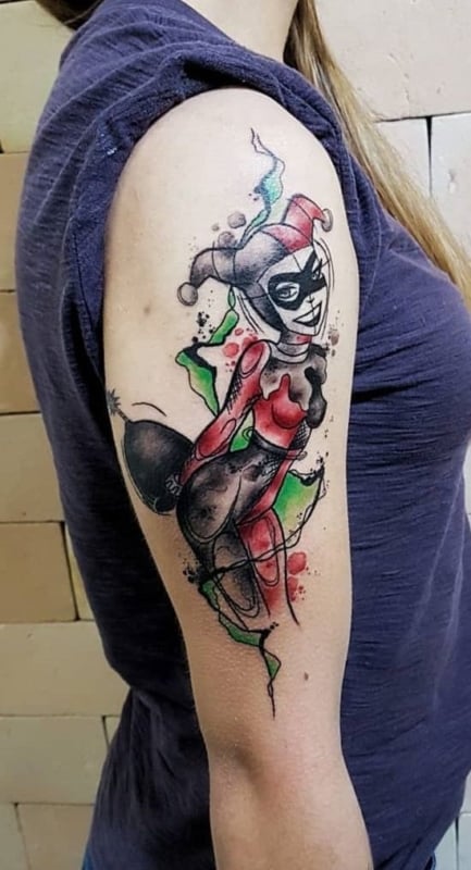 ideia de Tatuagem Arlequina no braço