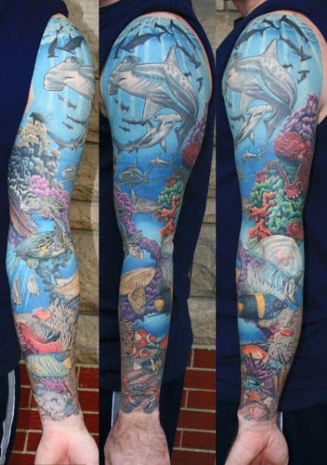 tatuagem fundo do mar no braço grande