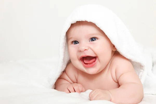depositphotos 6673099 stock photo laughing baby with towel