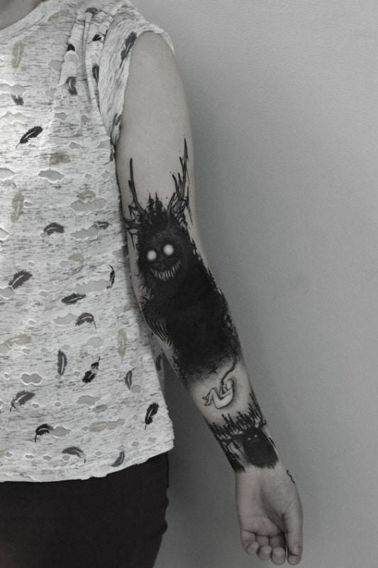 tatuagem dark linda no braco