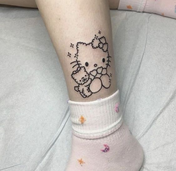 14 tatuagem fofa Hello Kitty na perna Pinterest
