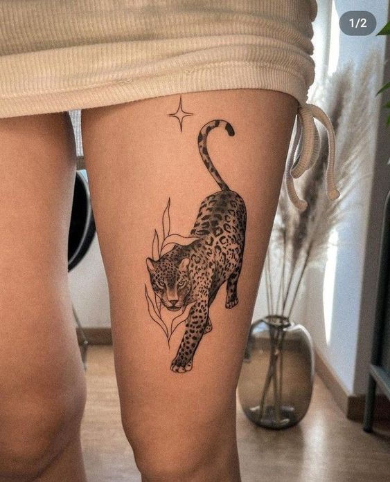 4 tatuagem feminina de onca na perna Pinterest