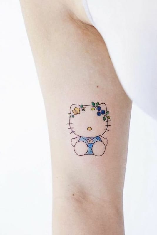 7 tatuagem fofa de Hello Kitty no braco Pinterest