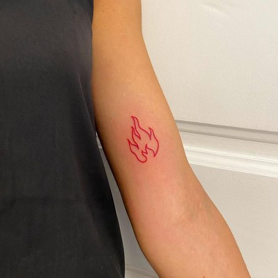28 tatuagem vermelha de fogo no braco Saved Tattoo