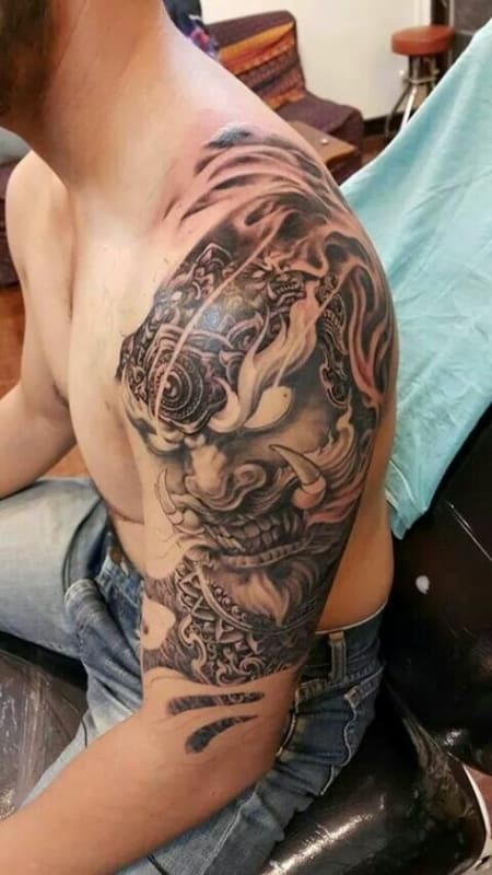 modelo de tatuagem carranca no braço