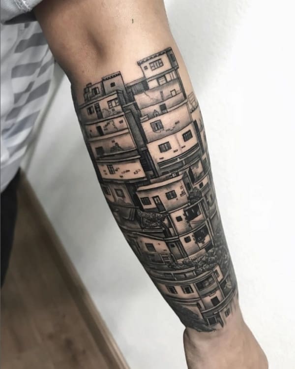 14 tatuagem grande de favela no braço @damasiotattoo