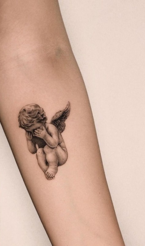 2 tatuagem delicada no braço anjo bebê @yumemonchi